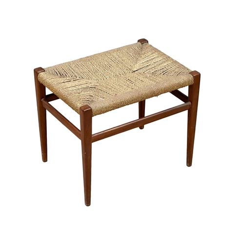 202 - A Danish Mid Century teak footstool with woven top. 46x34x39cm (1)