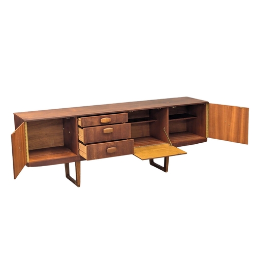 203 - A Mid Century teak sideboard by Stonehill. 198x45x73cm(3)