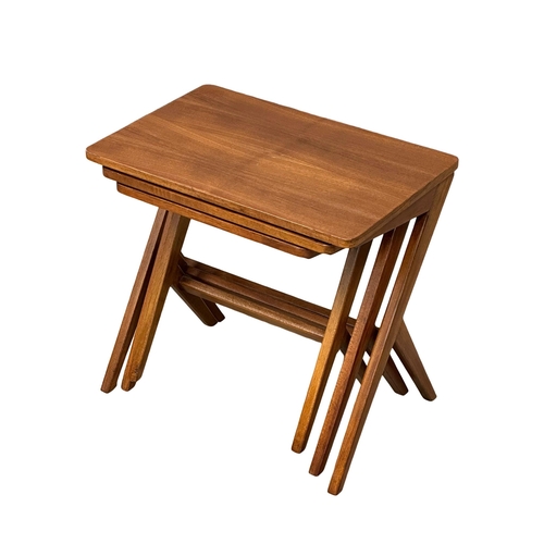 24 - Bengt Ruda for Nordiska Kompaniet. A 1950’s Swedish Mid Century “Walking” nest of tables. Designed b... 