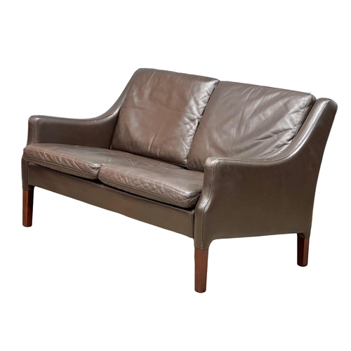 26 - Borge Mogensen. A Danish Mid Century rosewood and leather 2 seater sofa. Designed by Borge Mogensen ... 