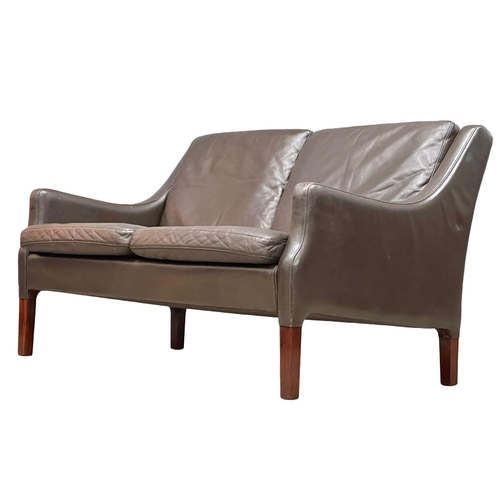 26 - Borge Mogensen. A Danish Mid Century rosewood and leather 2 seater sofa. Designed by Borge Mogensen ... 