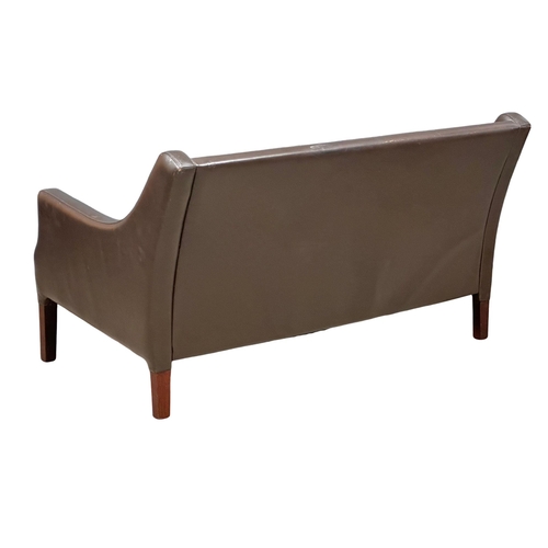 26 - Borge Mogensen. A Danish Mid Century rosewood and leather 2 seater sofa. Designed by Borge Mogensen ... 