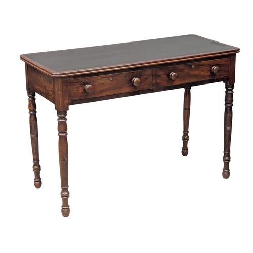 287 - A 19th Century Early Victorian mahogany writing table with 2 drawers on turned legs. Circa 1840s. 11... 