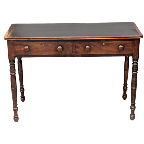 287 - A 19th Century Early Victorian mahogany writing table with 2 drawers on turned legs. Circa 1840s. 11... 