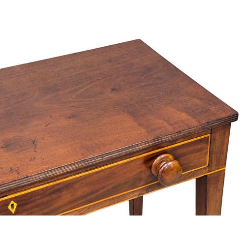 310 - A George III inlaid mahogany side table. Circa 1800. 89x39x72cm (3)