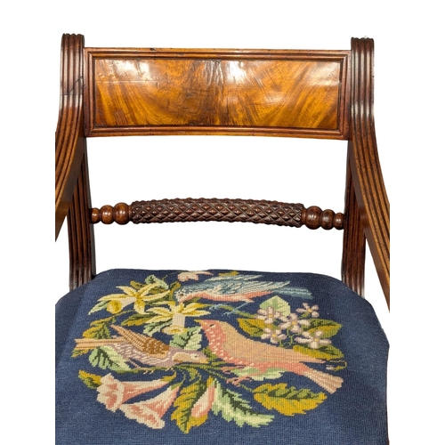 370 - An Early 19th Century Regency Period mahogany armchair with tapestry seat on Sabre legs. (3)