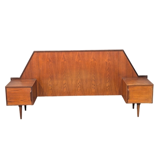 386 - A Mid Century teak headboard. 223x99.5cm total. 140cm between bedsides. (4)