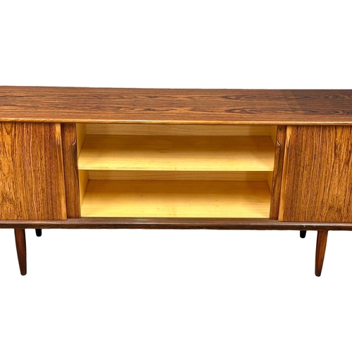 5A - Gunni Omman for Axel Christensen Odder.  A Danish Mid Century rosewood sideboard. Designed by Gunni ... 