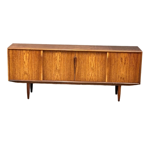 5A - Gunni Omman for Axel Christensen Odder.  A Danish Mid Century rosewood sideboard. Designed by Gunni ... 