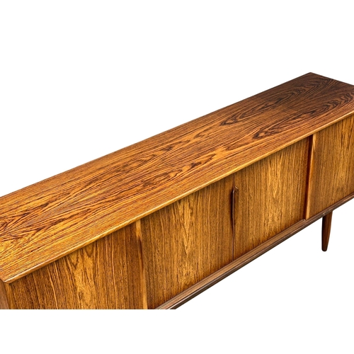 5A - Gunni Omman for Axel Christensen Odder.  A Danish Mid Century rosewood sideboard. Designed by Gunni ... 