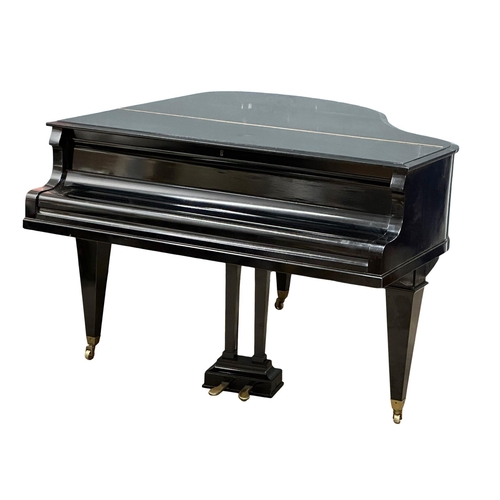 70 - A Schiedmayer Pianofortefabrik baby grand piano. 146x153x100cm