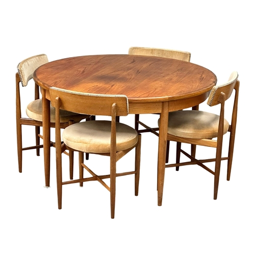 93 - A G-Plan “Fresco” Mid Century teak extending dining table and 6 chairs. Designed by Victor Wilkins. ... 