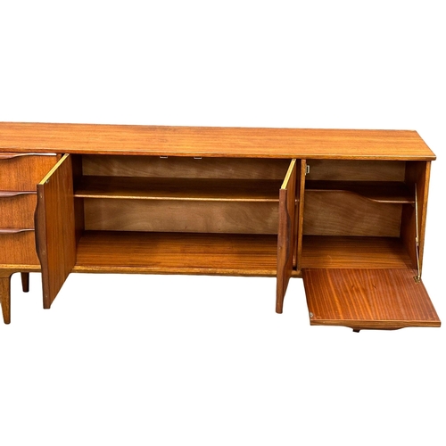 19 - A Mid Century teak sideboard by Jentique. 198x47x79cm(5)