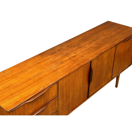 19 - A Mid Century teak sideboard by Jentique. 198x47x79cm(5)