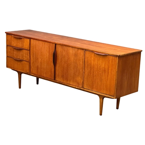 19 - A Mid Century teak sideboard by Jentique. 198x47x79cm(5)