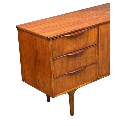 19 - A Mid Century teak sideboard by Jentique. 198x47x79cm(5)