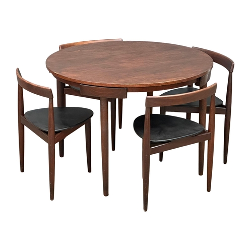 1A - Hans Olsen for Frem Rojle. A Danish Mid Century teak “Roundette” dining table and 4 chairs. Designed... 