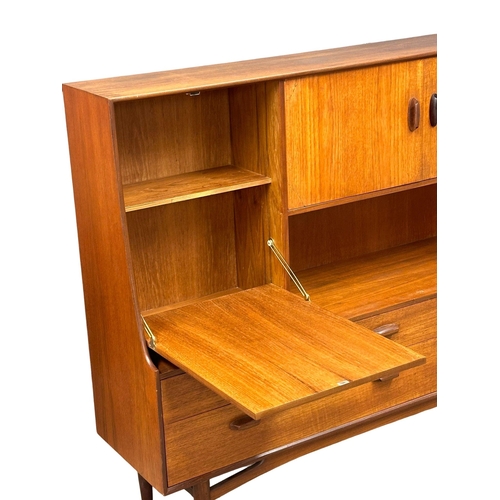 22 - A G-Plan “Brasilia” Mid Century teak highboard cocktail sideboard. 153x43.5x136cm (5)