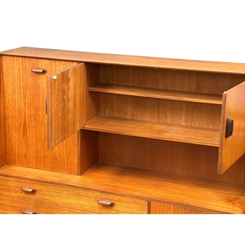 22 - A G-Plan “Brasilia” Mid Century teak highboard cocktail sideboard. 153x43.5x136cm (5)