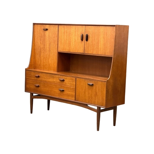 22 - A G-Plan “Brasilia” Mid Century teak highboard cocktail sideboard. 153x43.5x136cm (5)