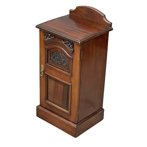 239 - A Late Victorian mahogany bedside cabinet. Circa 1900. 39x34x82cm(5)