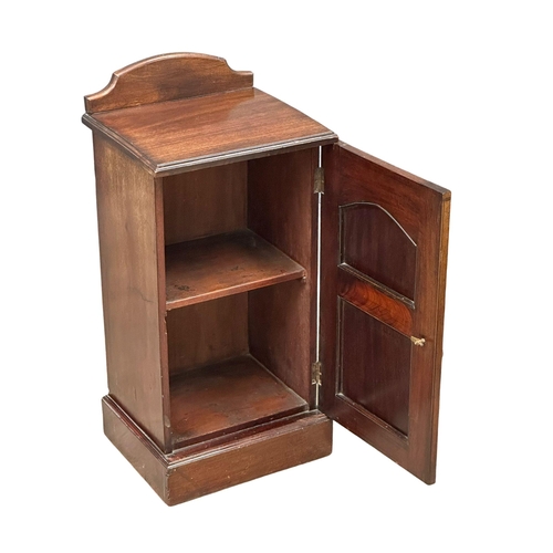 239 - A Late Victorian mahogany bedside cabinet. Circa 1900. 39x34x82cm(5)