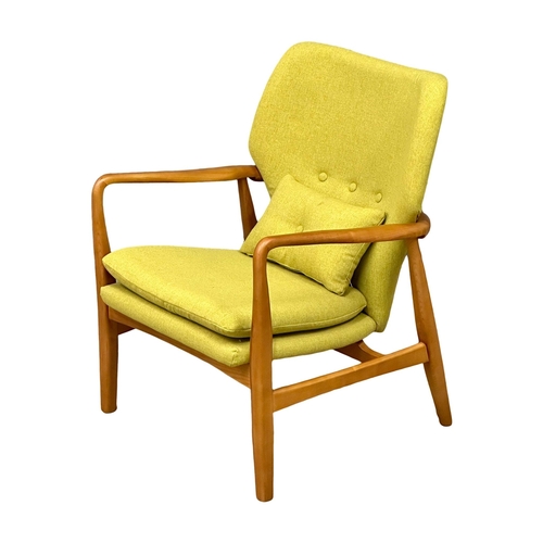 25 - The Jensen chair. A good quality Danish style ash framed armchair. 65x74x83cm