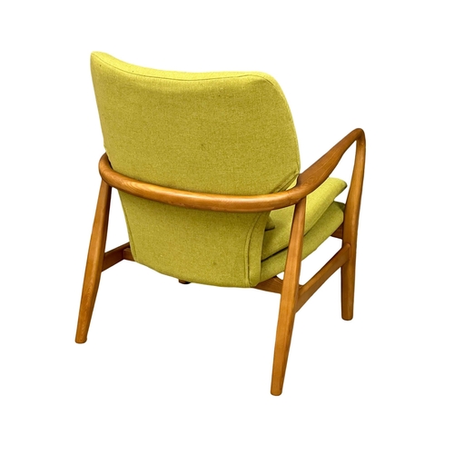 25 - The Jensen chair. A good quality Danish style ash framed armchair. 65x74x83cm