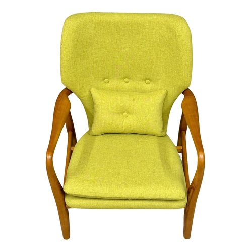 25 - The Jensen chair. A good quality Danish style ash framed armchair. 65x74x83cm