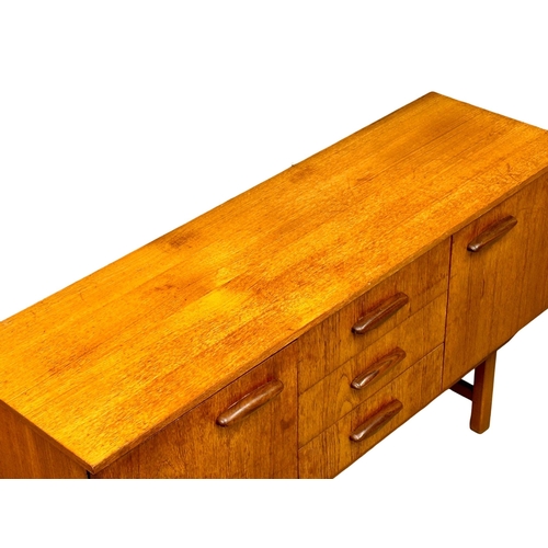 296 - A 1960’s Mid Century teak sideboard. 135x41x74cm(3)