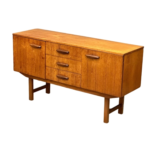 296 - A 1960’s Mid Century teak sideboard. 135x41x74cm(3)