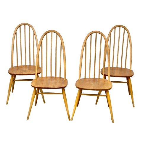 299 - A set of 4 Ercol Mod Century elm and beech dining chairs. Model 365.(3)