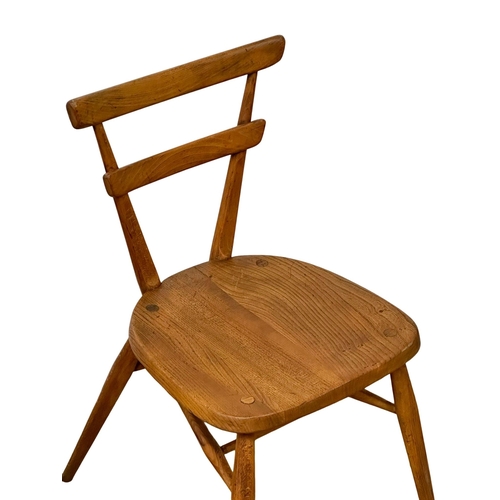 35 - A set of 4 Ercol Mid Century elm “Green Dot” chairs. Stacking chairs.