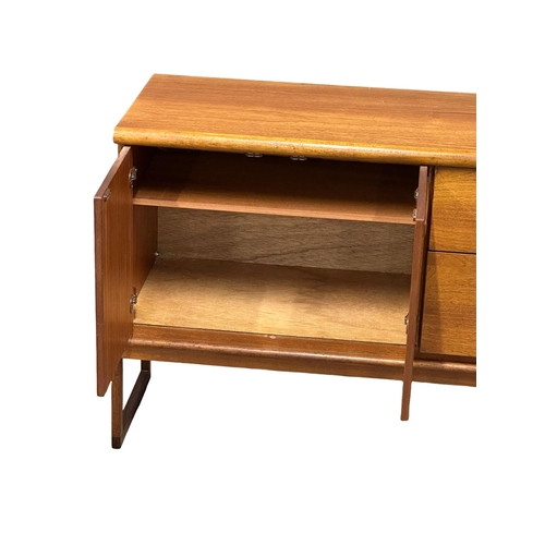 373 - A Mid Century teak sideboard by Meredew. 139x42x80cm(5)