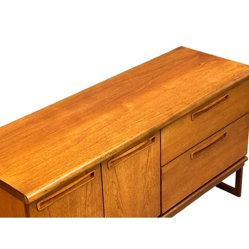 373 - A Mid Century teak sideboard by Meredew. 139x42x80cm(5)