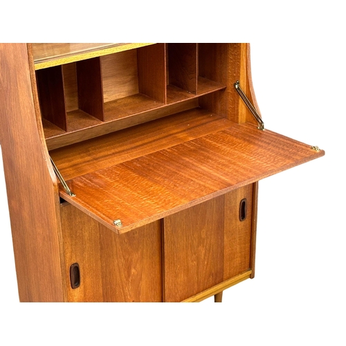 374 - A 1960’s Mid Century teak fall front bureau bookcase. 76x30.5x146.5cm(4)