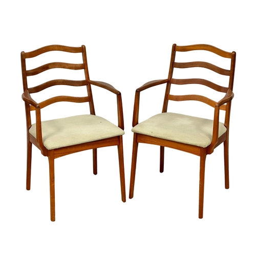 384 - A set of 6 Mid Century teak ladder back dining chairs(5)