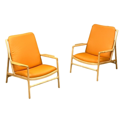 39 - A pair of good quality Danish style ash framed armchairs. 76x81x92cm