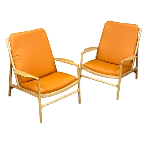 39 - A pair of good quality Danish style ash framed armchairs. 76x81x92cm