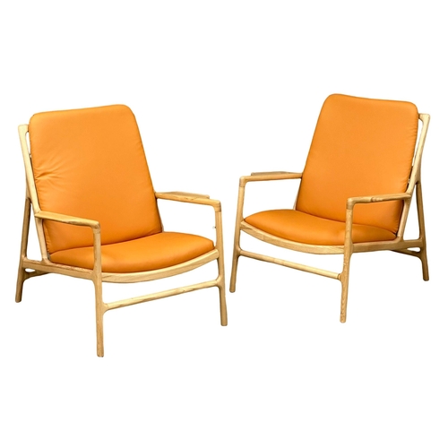 39 - A pair of good quality Danish style ash framed armchairs. 76x81x92cm