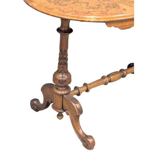 407 - A Mid 19th Century Victorian Burr Walnut library table with carved turned support on Cabriole legs. ... 