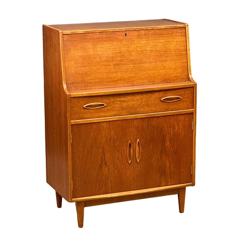 43 - A Mid Century teak writing bureau by Jentique. 1960’s. 75.5x40.5x107cm(4)