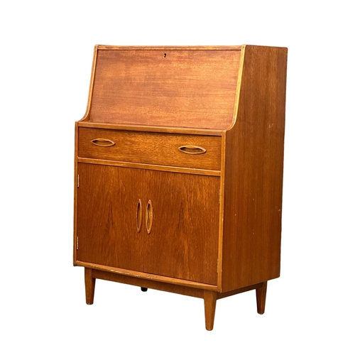 43 - A Mid Century teak writing bureau by Jentique. 1960’s. 75.5x40.5x107cm(4)