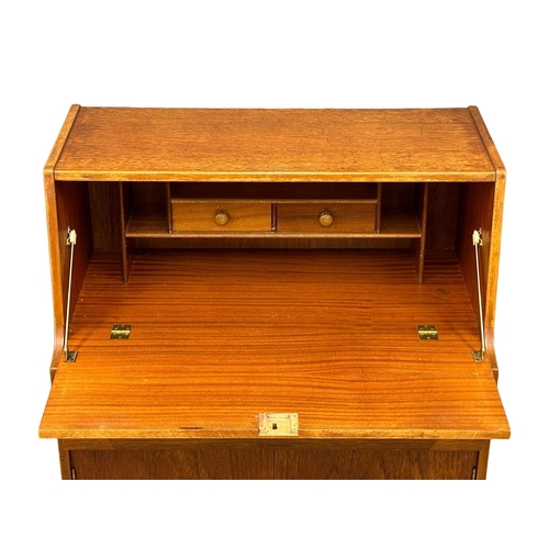 43 - A Mid Century teak writing bureau by Jentique. 1960’s. 75.5x40.5x107cm(4)