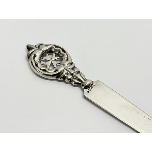 589 - A vintage Maltese MC 917 silver letter opener. 28 grams. 20cm (2)