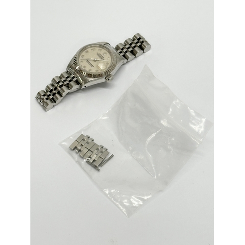 600 - A Rolex Oyster Perpetual Datejust watch with box and paperwork. (4)