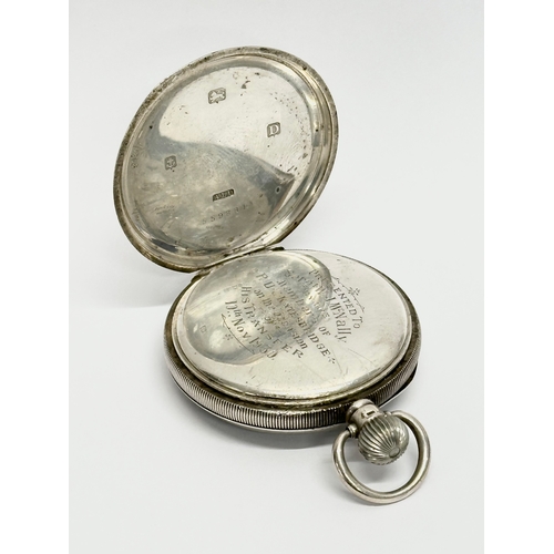 640 - Aaron Lufkin Dennison. An Early 20th Century silver pocket watch. Presented to Serg W.J McNally. By ... 