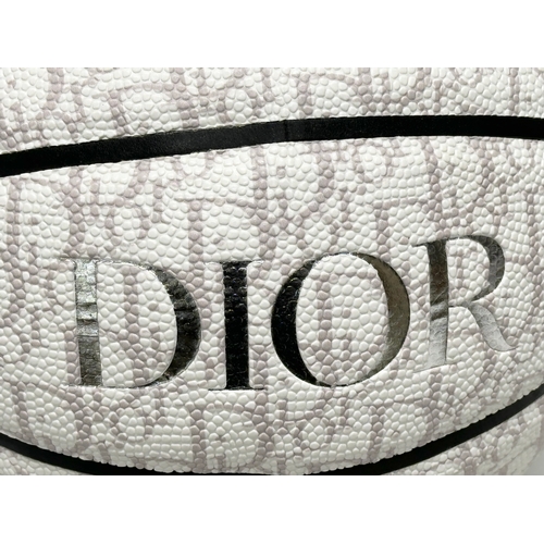 642 - A Dior basketball.