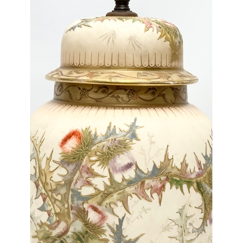 102 - Royal Bonn. A large Early 20th Century German hand painted table lamp, raised on a pierced gilt bras... 