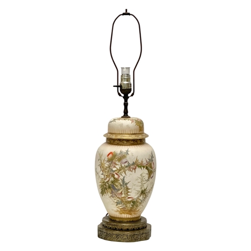 102 - Royal Bonn. A large Early 20th Century German hand painted table lamp, raised on a pierced gilt bras... 